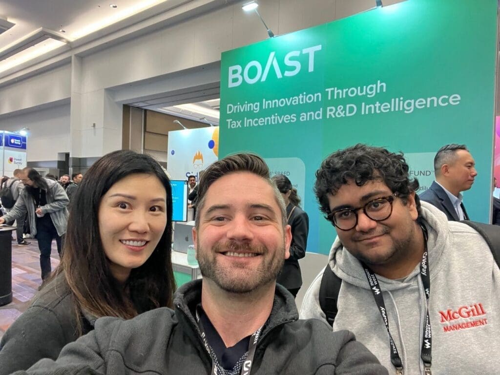 Miriam Dong, Paul Davenport and Reporters from Betakit on the floor at InnovateWest in Vancouver 2024.