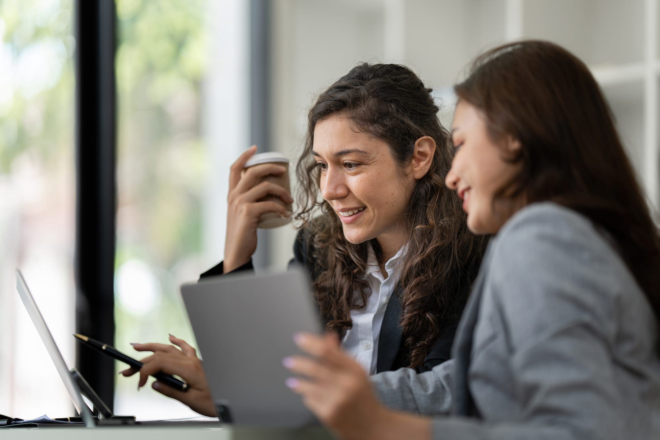 Fund managers team consultation and discuss about analysis Investment stock market by digital tablet